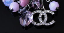 Load image into Gallery viewer, Chanel extra long pink 07C Ribbon bead &amp; Crystal logo earrings