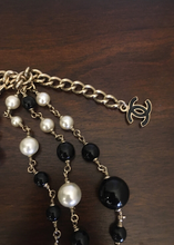 Load image into Gallery viewer, RARE Chanel 100th Anniversary 2010 Cruise 10C Black White Gold Pearl Coco Figure Sautoir 3 Strand Long Necklace