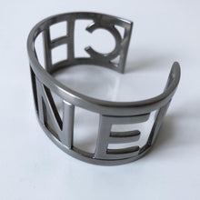 Load image into Gallery viewer, Chanel 15P 2015 Spring Block Letters Cuff Letter Bracelet Bangle