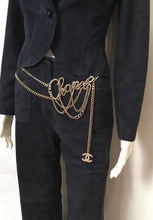 Load image into Gallery viewer, Chanel cursive chain belt worn at the waist. 