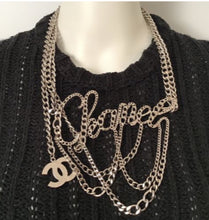 Load image into Gallery viewer, Rare Chanel cursive belt/necklace being worn as a Chanel necklace.